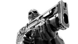 A masked figure holding a chunky gun in the Den of Thieves announcement.