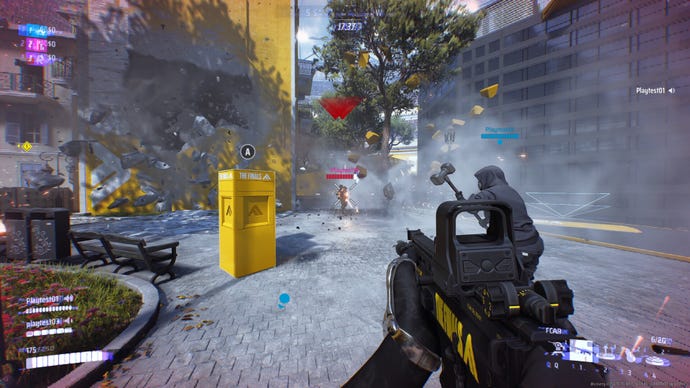 A screenshot from The Finals showing a player running towards a yellow cashout point with another player holding a big hammer and some dust clouds in the distance