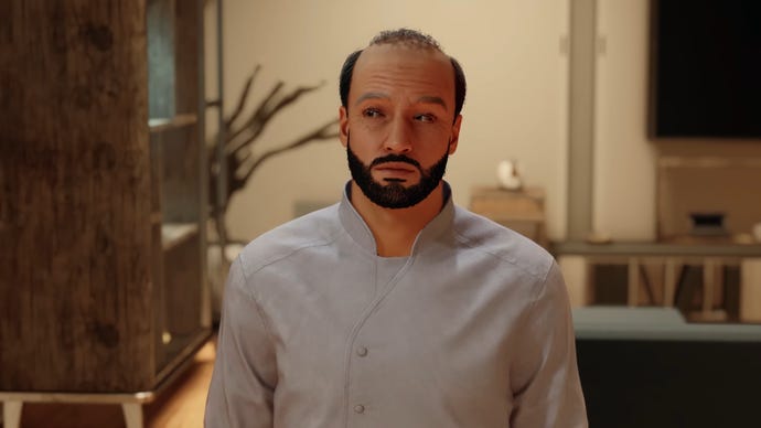 The player character's dad stands in his home in front of the camera in Starfield.