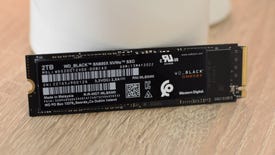 The WD Black SN850X SSD propped up on a desk.
